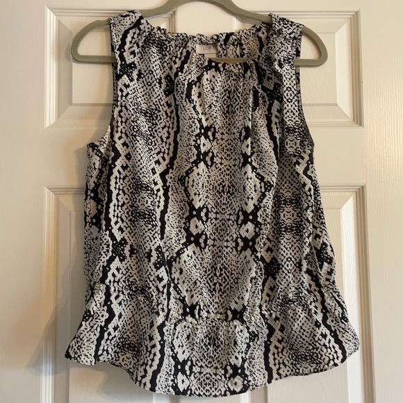 LOFT Tops - Loft L snakeskin peplum sleeveless blouse with tie bow at top